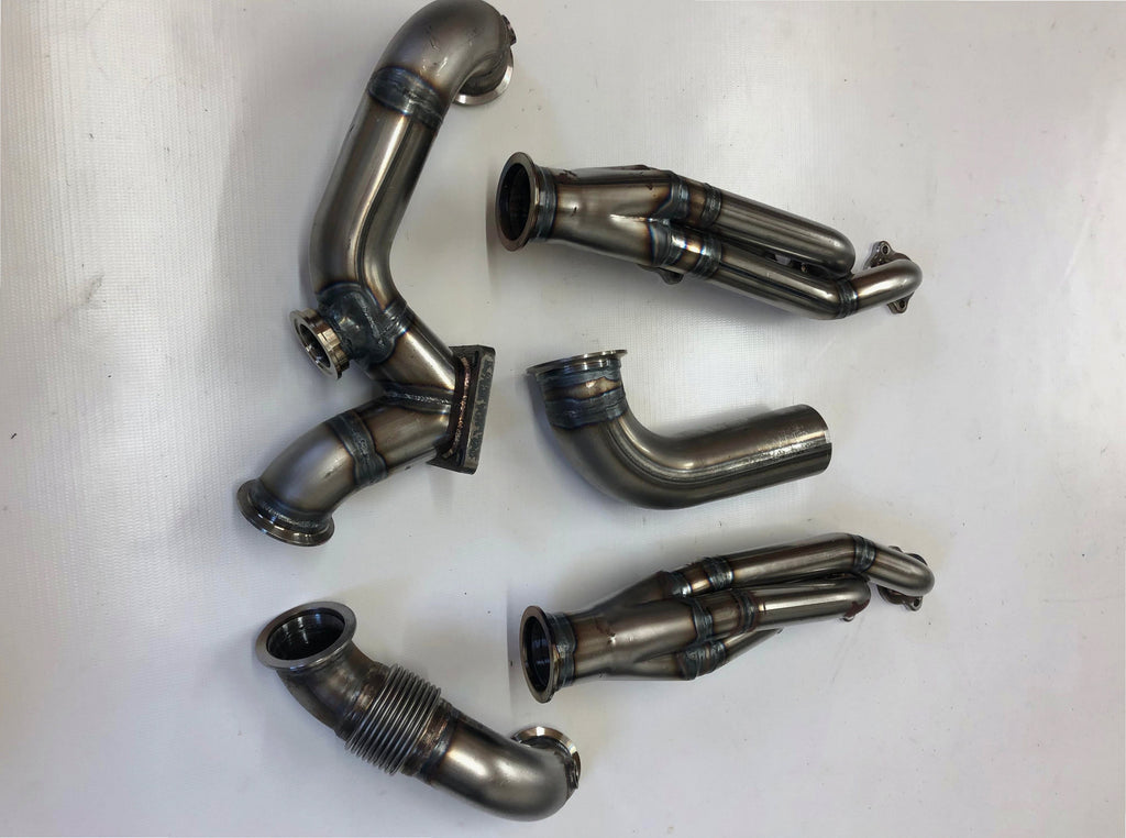 5.4 4V Turbo Street / Drag Kit A/C Delete — passenger-side header with V-band flange and merge collector