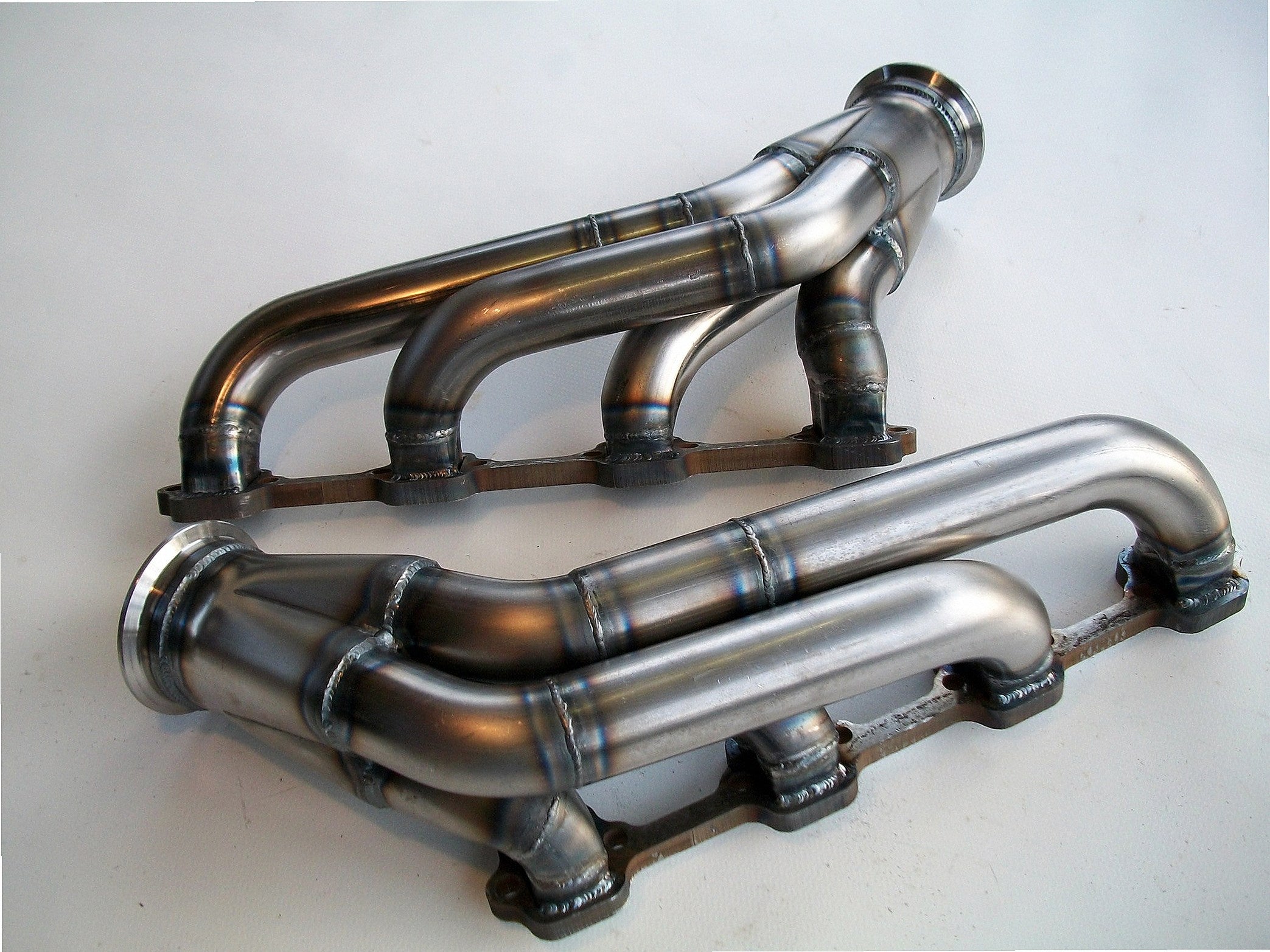 5.0 Mustang Turbo Headers — detail view of merge collector, flex bellow joint, and V-band connection