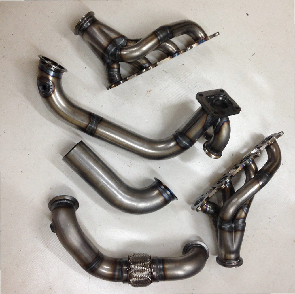Coyote Turbo Swap / Fox Body Street/Drag Kit — detail view of merge collector, flex bellow joint, and V-band connection