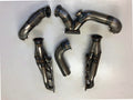 5.4 4V Turbo Street / Drag Kit A/C Delete — complete turbo hot-side kit with mild steel tubular headers, crossover pipe with flex bellow, starter downpipe, and turbo mount flange