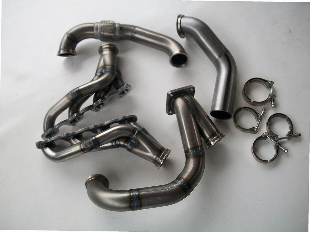 4.6 2V Turbo Fox Body Race Kit — detail view of merge collector, flex bellow joint, and V-band connection