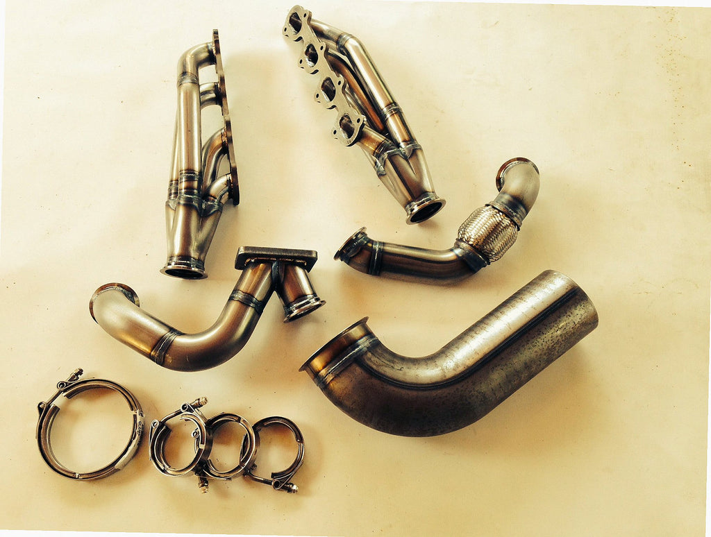 Modular 2V TO6 Turbo Race Kit — detail view of merge collector, flex bellow joint, and V-band connection