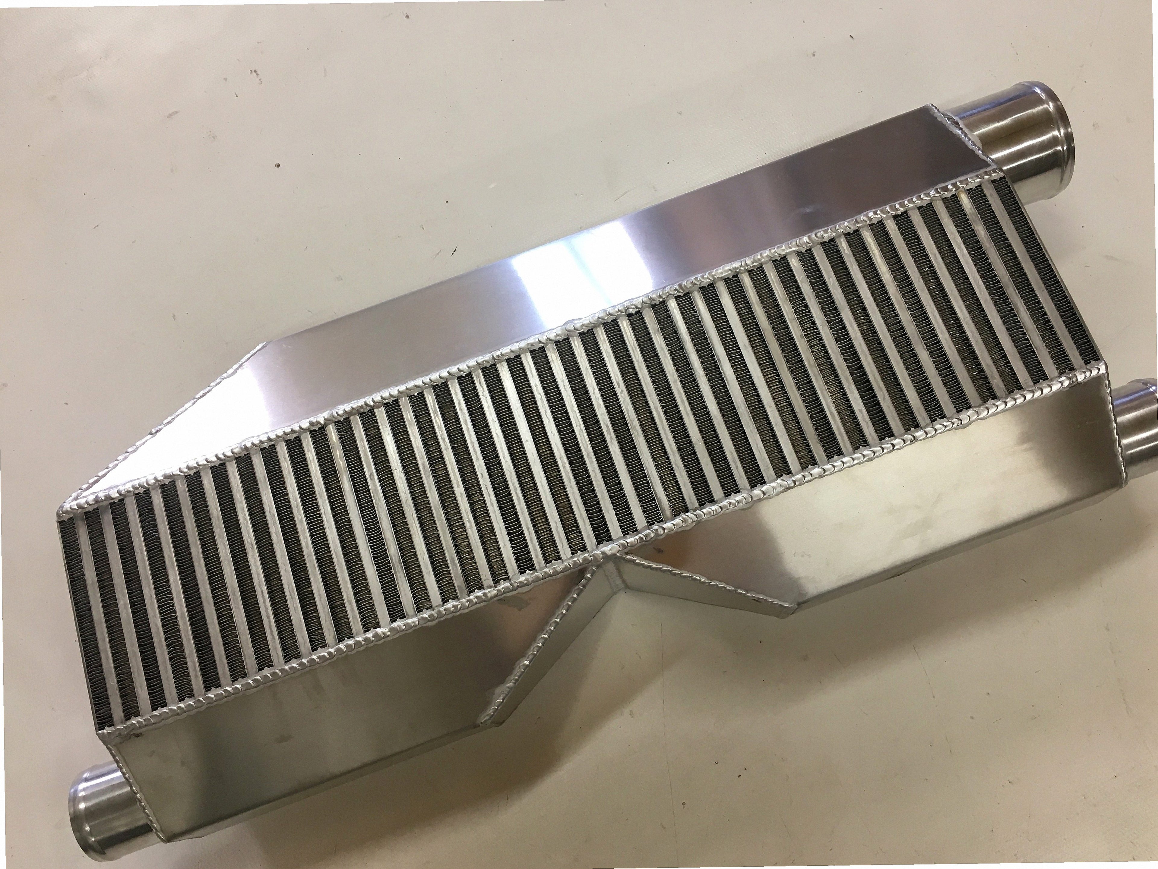 Twin Turbo Intercooler 1800 HP — fabricated aluminum bar-and-plate intercooler core with TIG-welded end tanks