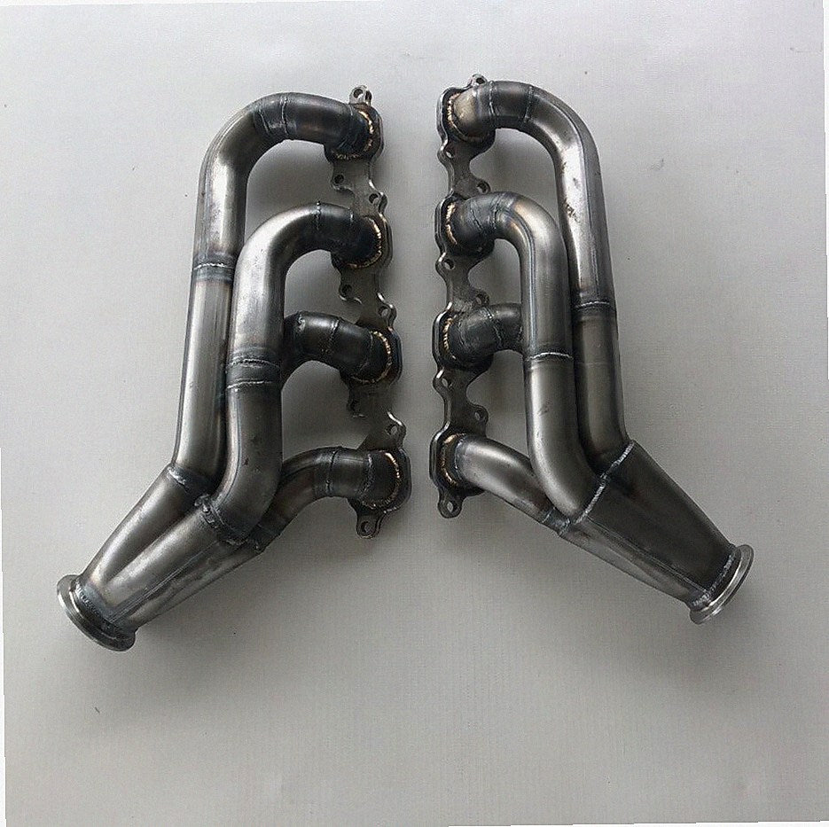 7.3 Godzilla Swap Turbo Headers — facing-forward tubular turbo headers in mild steel with V-band flanges and CNC head flanges