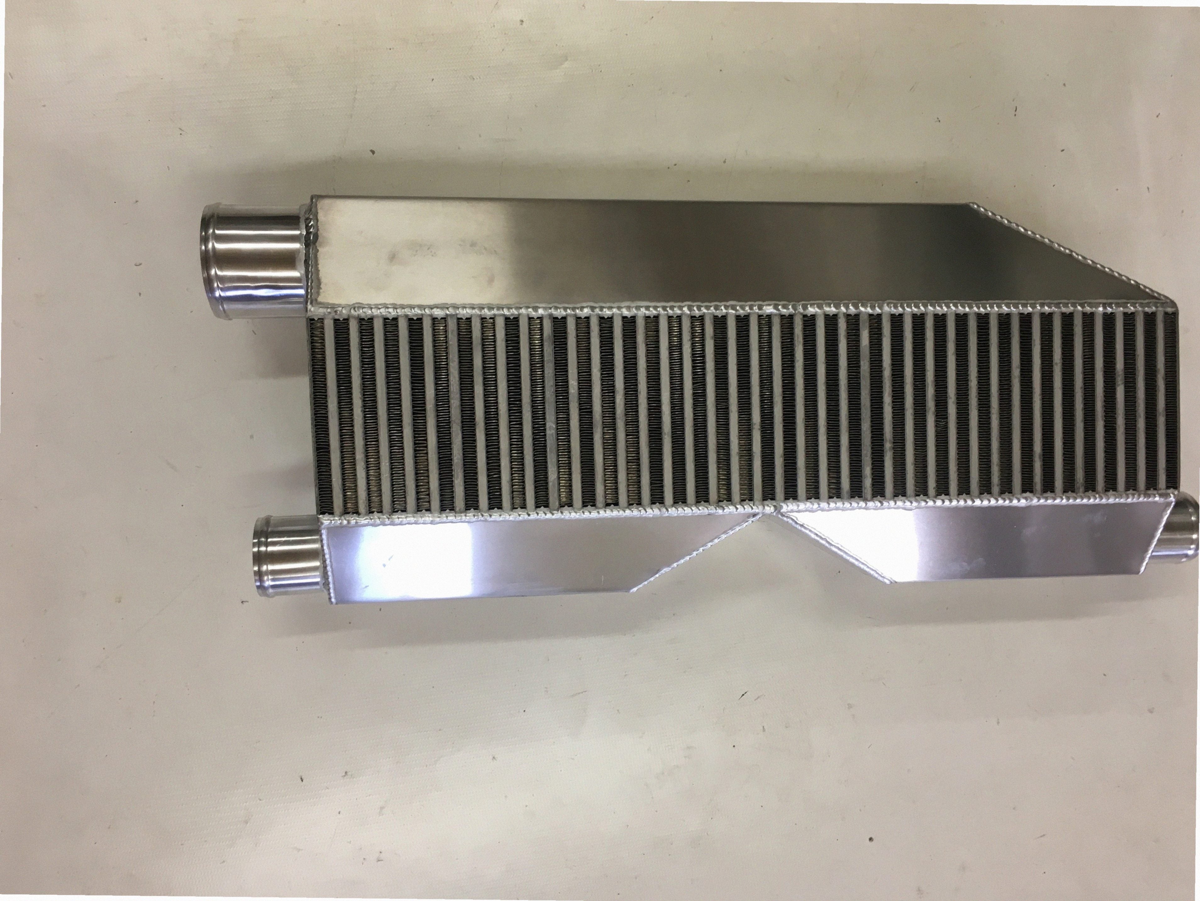 Twin Turbo Intercooler 1800 HP — intercooler core detail showing bar-and-plate fin density and TIG-welded seams