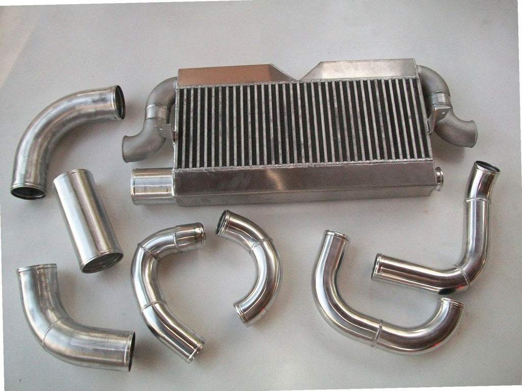 Twin Turbo 4V Intercooler Kit — intercooler core detail showing bar-and-plate fin density and TIG-welded seams