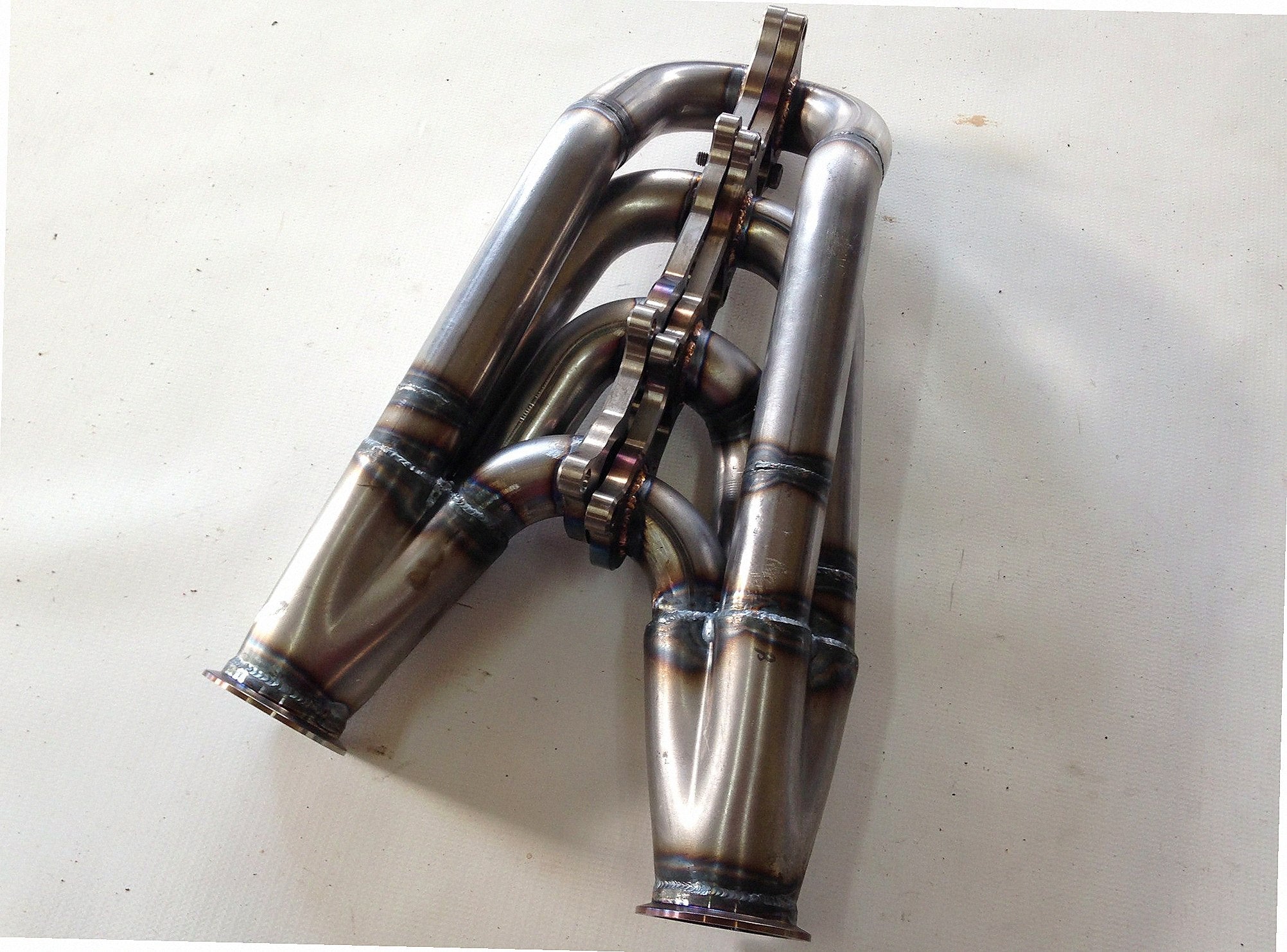 5.0 Coyote Racing Headers — facing-forward tubular turbo headers in aluminum with V-band flanges and CNC head flanges