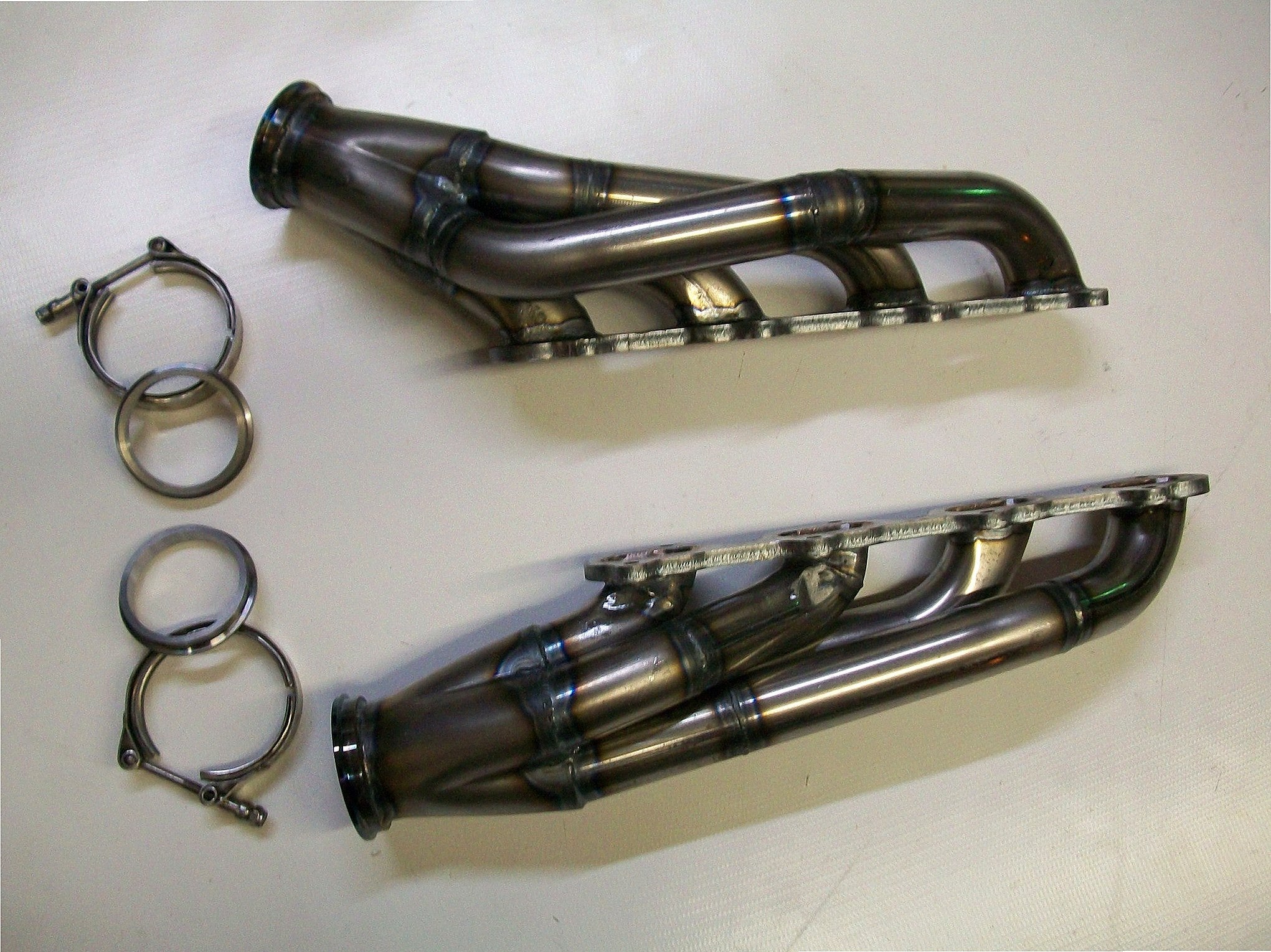 4.6 4V Turbo Headers A/C Delete Pulley — facing-forward tubular turbo headers in mild steel with V-band flanges and CNC head flanges