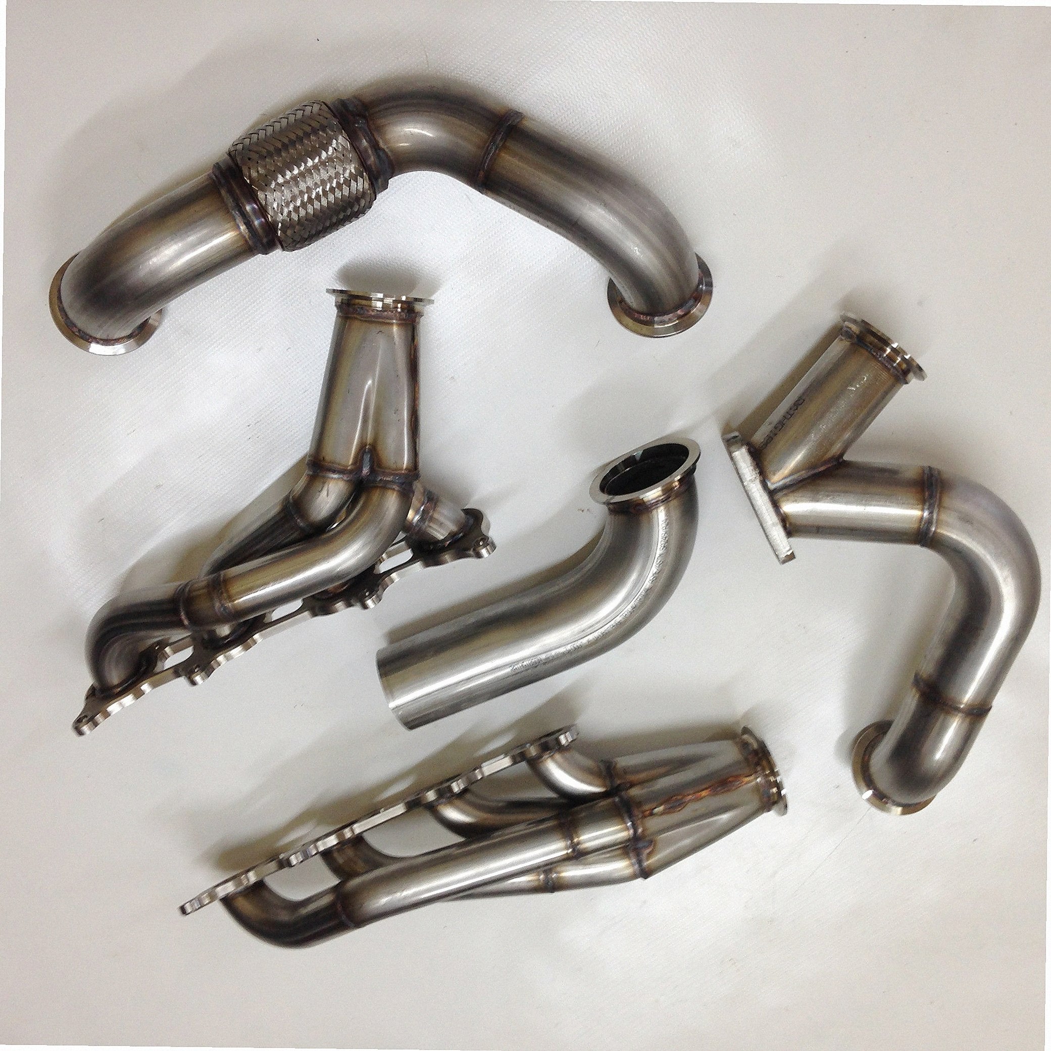 Coyote Swap Drag Kit — detail view of merge collector, flex bellow joint, and V-band connection