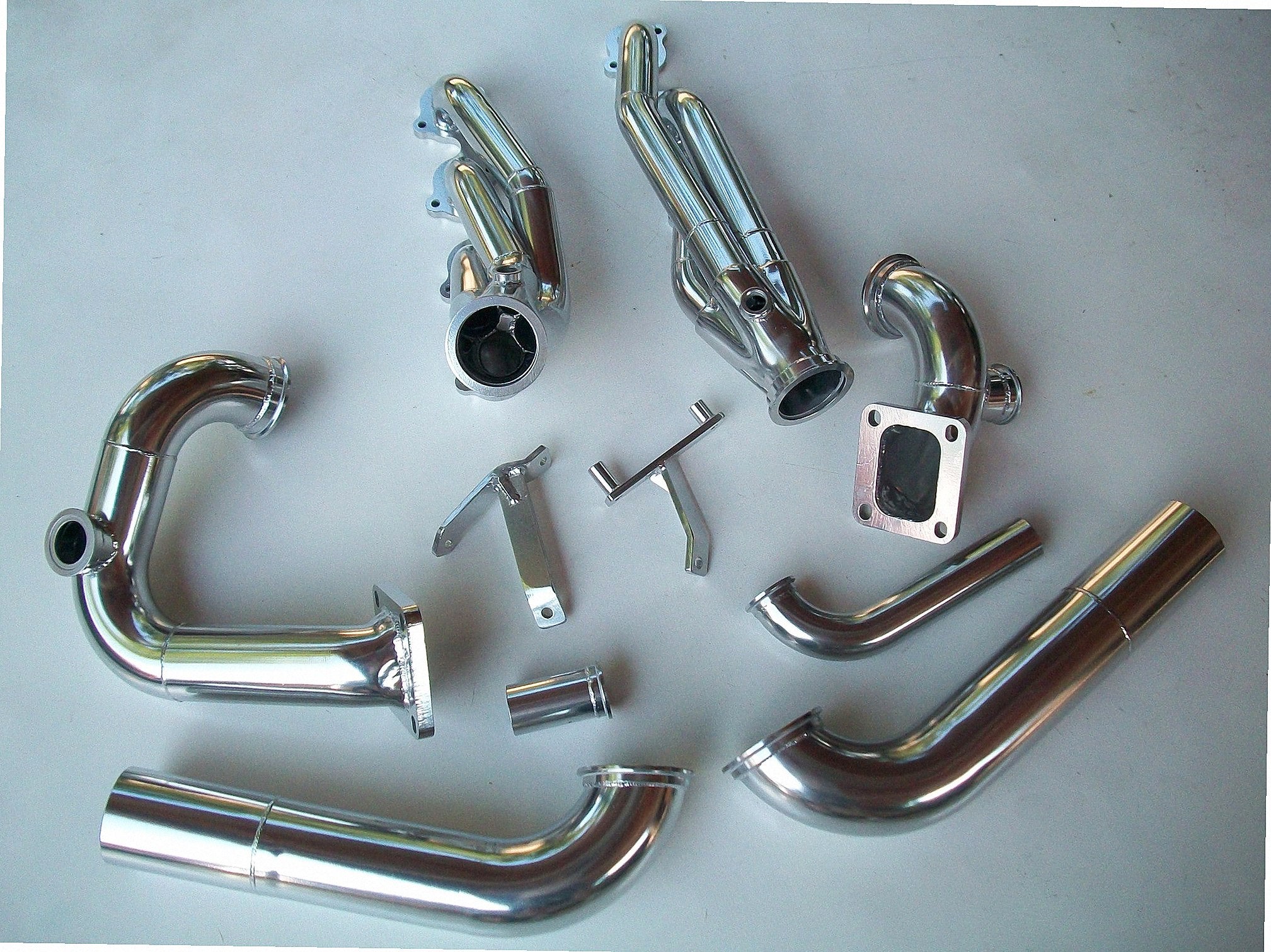 4.6 2V Twin Turbo Hotside — detail view of merge collector, flex bellow joint, and V-band connection